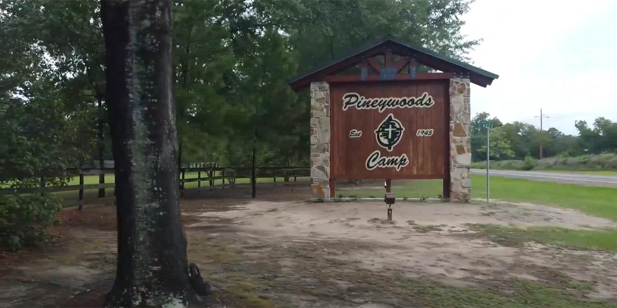 pinewoods camp sign